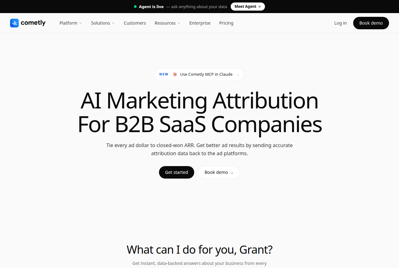Cometly home page headlined 'AI Marketing Attribution for B2B SaaS Companies' with a sales-by-source table showing booked demos through to closed-won ARR.